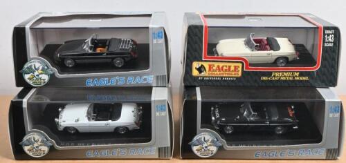 M.G: Four 1:43 scale EAGLE'S RACE MGB MKII model cars. Two 'POLICE' livery MGB MKII's