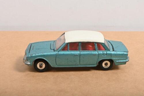 DINKY: A Dinky Toys Triumph 2000 (135). Turquoise body with white roof