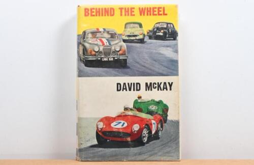 McKAY: A first edition hardback copy of 'Behind the Wheel' by David McKay. Title page signed by David McKay with personal message signed at Sandown-Fangio 1978