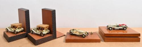MATCHBOX: Four Matchbox Giftware items. Pair of gold plated Lesney Matchbox Models of Yesteryear Thomas Flyer bookends & Y10 Mercedes 36 220 mounted on hinged wooden box