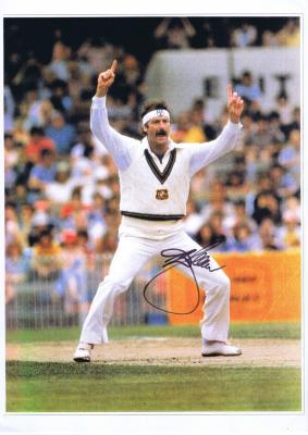 DENNIS LILLEE: A colour picture featuring Lillee appealing, autographed by Dennis Lillee