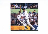 GREG CHAPPELL: A colour picture depicting Greg Chappell batting, autographed by Chappell