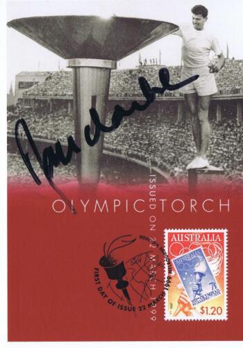 RON CLARKE: A 1999 Olympic Torch First Day Cover post card autographed by Ron Clarke