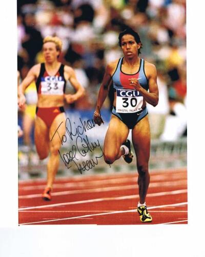 CATHY FREEMAN: A offical licensed colour picture by 'The Herald & Weekly Times' depicting Cathy Freeman. Personally inscribed and signed by Freeman