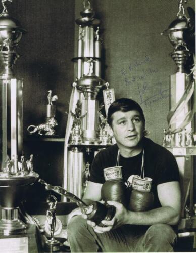 JOHNNY FAMECHON: A black and white portrait of Australian boxer Johnny Famechon, personally signed and inscribed