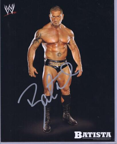 BATISTA: A official WWE publicity card depicting the Batista, autographed by Dave Bautista