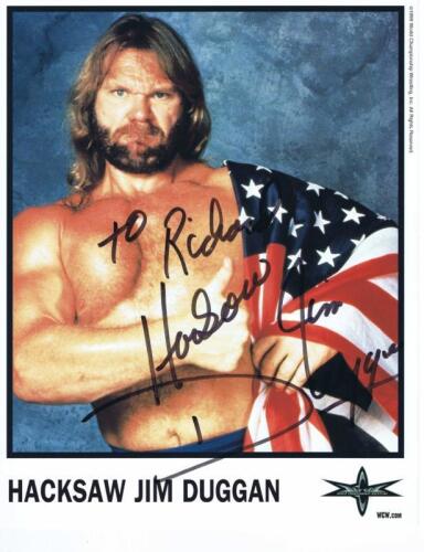 HACKSAW: A official WCW publicity card of Jim Duggan AKA 'Hacksaw' personally inscribed and signed by Jim Duggan