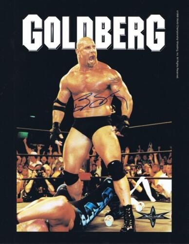 GOLDBERG: A official publicity card depicting 'Goldberg' autographed by Bill Goldberg