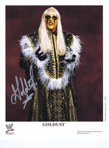 GOLDUST: A official WWE publicity card of 'Goldust' autographed by Dustin Rhodes