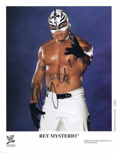 REY MYSTERIO: A official colour publicity card depicting Rey Mysterio, autographed