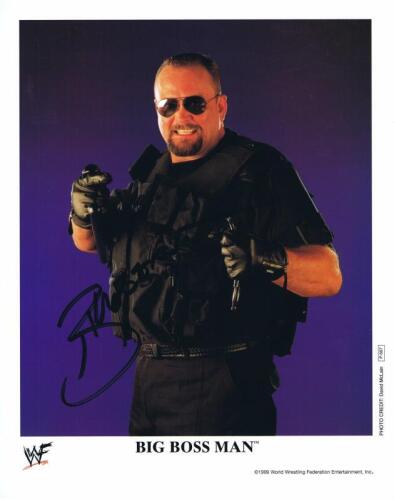 BIG BOSS MAN: A official WWF publicity card depicting 'Big Boss Man' autographed by Ray Washington