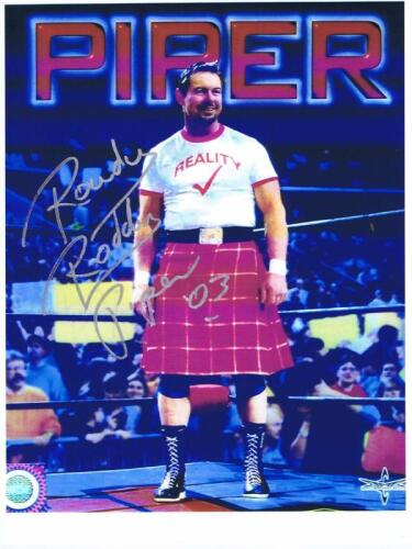 ROWDY RODDY PIPER: A picture depicting Rowdy Roddy Piper, with autograph