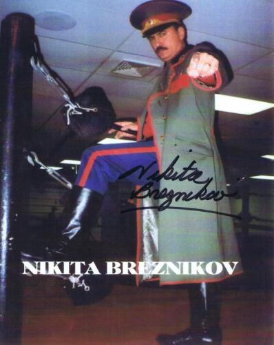 NIKITA BREZNIKOV: A colour picture depicting Nikita Breznikov, with autograph
