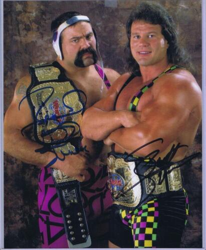 STEINER BROTHERS: A colour picture depicting the 'Steiner Brothers' autographed by both Rick and Scott Steiner