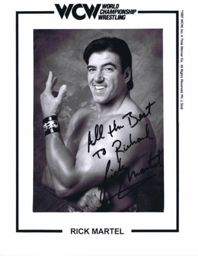 RICK MARTEL: A official WCW publicity card for Rick Martel, personally inscribed and signed by Martel