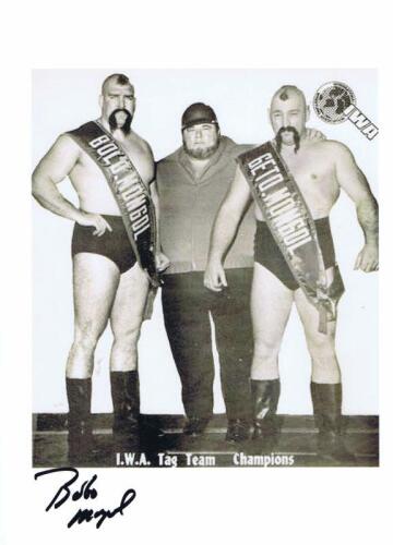 BOLO MONGOL: A black and white picture depicting I.W.A Tag Team Champions Bolo Mongol and Geto Mongol, autographed by Bolo Mongol AKA Bill Eadie