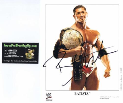 BATISTA: A official WWE publicity card depicting the Batista, autographed by Dave Bautista with COA
