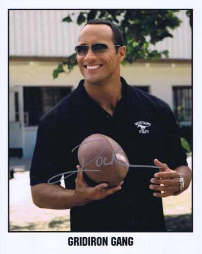 DWAYNE JOHNSON: A publicity card for film Gridiron Gang, autographed by Dwayne 'The Rock' Johnson
