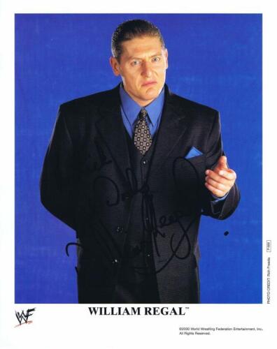 WILLIAM REGAL: A official WWF publicity card, personally inscribed and signed by William Regal