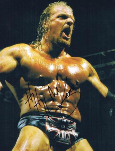TRIPLE H: A colour picture of 'Triple H' autographed by Paul Michael Levesque