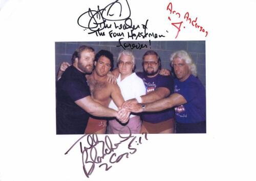 FOUR HORSEMEN: A colour picture of the Four Horsemen, autographed by Tully Blanchard, Arn Anderson and J.J. Dillion