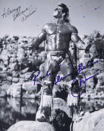 THE ULTIMATE WARRIOR: A black and white picture of 'The Ultimate Warrior' personally inscribed and signed by James Brian Hellwig