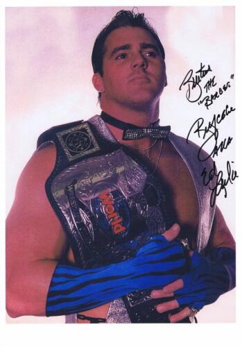 BRUTUS BEEFCAKE: A colour picture of Brutus 'The Barber' Beefcake, autographed by Edward Leslie