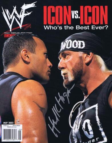 HULK HOGAN: A WWF magazine cover 'Icon VS Icon' featuring Hogan and The Rock, autographed by Hulk Hogan