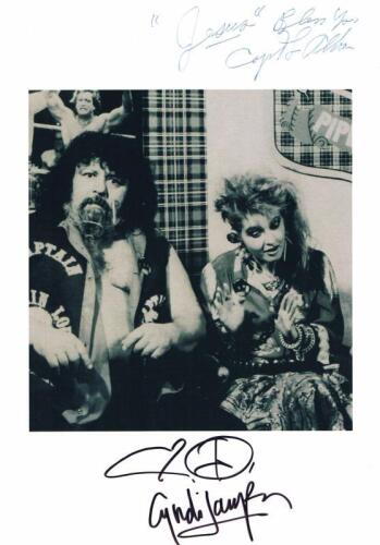 LOU ALBANO & CYNDI LAUPER: A black and white picture of Captain Lou Albano and Cyndi Lauper, autographed by both