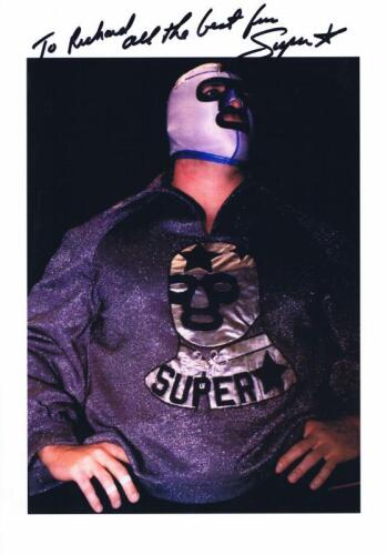 MASKED SUPERSTAR: A colour picture of 'The Masked Superstar' personally inscribed and signed by Billie Eadie