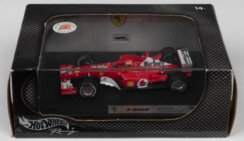 F-2002: A Hot Wheels Racing 1:43 scale Ferrari F-2002 as raced by Michael Schumacher (54618)