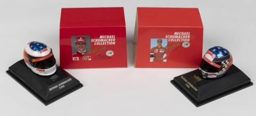SCHUMACHER: Two metal 1:8 scale Paul's Model Art (MS-COLLECTION) Michael Schumacher driver helmets from 1996 & 1998