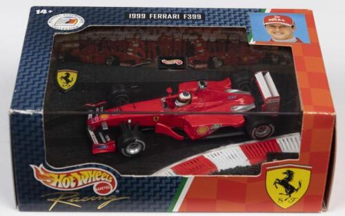 F399: A Hot Wheels Racing 1:43 scale 1999 Ferrari F399 as raced by Michael Schumacher (24525)