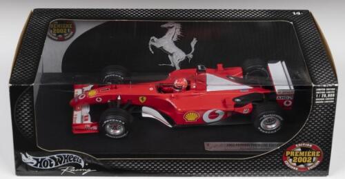 F-2002: A Limited Edition Hot Wheels Racing 1:18 scale 2002 FERRARI PREMIERE EDITION featuring the F-2002 of Michael Schumacher (54643). Limited Edition of 20,000