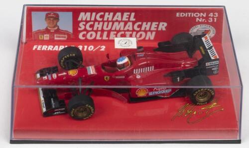 F 310/2: A Paul's Model Art/MINICHAMPS 1:43 scale FERRARI F310/2 as raced by Michael Schumacher