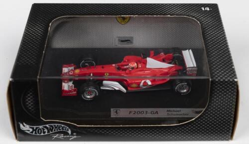 F2003-GA: A Hot Wheels Racing, 2003 Racing Edition 1:43 scale FERRARI F2003-GA as raced by Michael Schumacher (B1018)