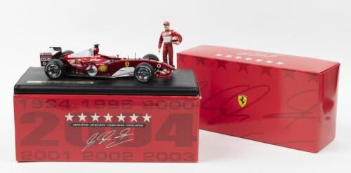 SCHUMACHER: A Limited Edition Hot Wheels Racing 1:18 scale Ferrari F2004 (B6220). With standing Michael Schumacher figurine. Limited Edition of 10,000, numbered '04665'