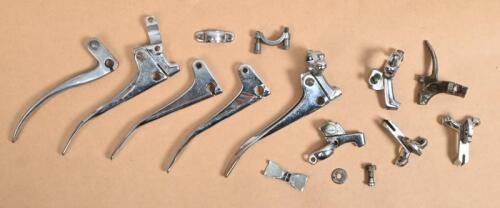 HANDLE BAR LEVERS: A collection of assorted British handle bar levers and screws