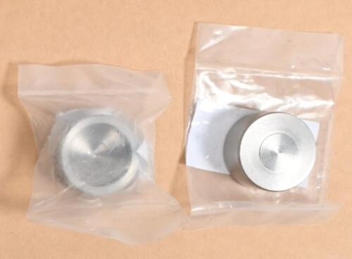 TRIUMPH: A NOS pair of Triumph caliper pistons by L.F. Harris Part No 992765