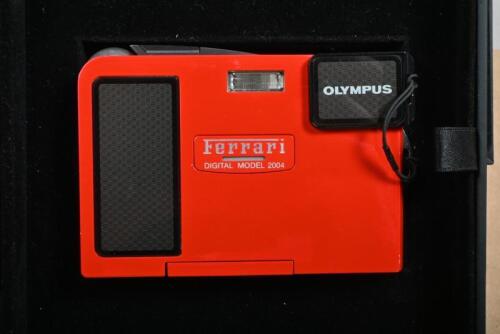 FERRARI DIGITAL CAMERA: A Limited Edition "Ferrari DIGITAL MODEL 2004" Olympus camera. Numbered '07521' of 10,000 units