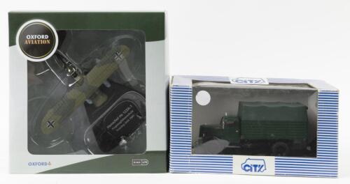 GERMAN: Two German related scale models. 1:72 scale OXFORD AVIATION Henschel Hs 123A-1 Flugzeugfuhrerschule Training Unit 1941 (AC040) in German military colours & CITY OPEL BLITZ 3.5 TON CARGO LOW CANVAS COVERED TRUCK (CL001B)&nbsp;in dark green