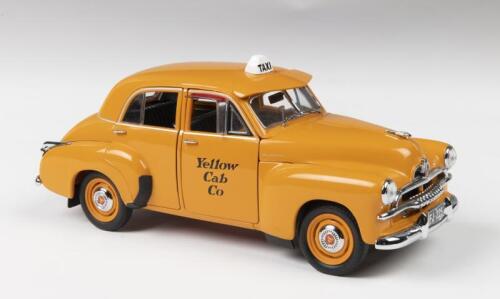 HOLDEN: A TRAX 1:24 scale FJ Holden Special Sedan in 'Yellow Cab Co' livery
