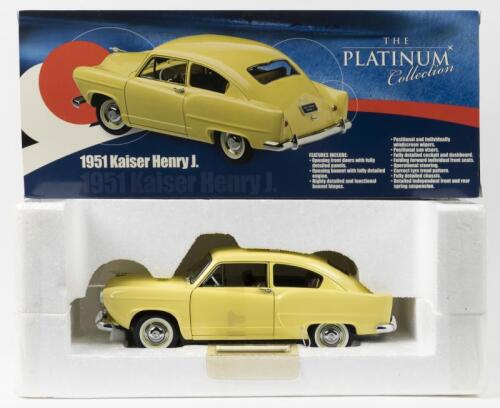 KAISER: A 1:18 scale Sun Star The PLATINUM Collection 1951 Kaiser Henry J.,in Arena Yellow