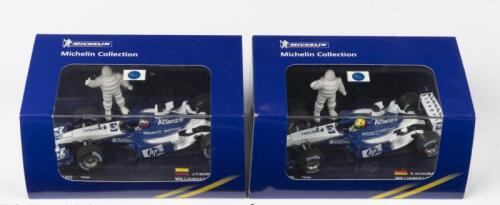 WILLIAMS F1: Two Michelin Collection 1:43 scale WILLIAMS F1 TEAM FW25 models as driven by team members R.Schumacher & J.P.Montoya. Special Limited Editions. Bibendum figurines