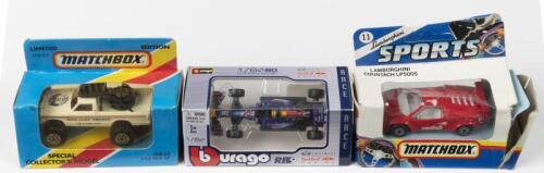 1:64 MODELS: A group of three 1:64 scale models. MATCHBOX SPECIAL COLLECTOR'S MODEL MB 63 4 X 4 PICK-UP (GELANDEWAGON), BOB JANE T-MARTS livery