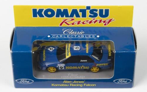 JONES: A 1:43 scale Classic CARLECTABLES&nbsp;Alan Jones Ford Komatsu Racing Falcon. Alan Jones signature