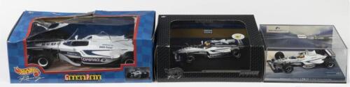 WILLIAMS: Three die-cast models in 1:43 and 1:24 scale by various model manufacturers of the WILLIAMF1 TEAM FW21 and FW22. As raced by Ralf Schumacher