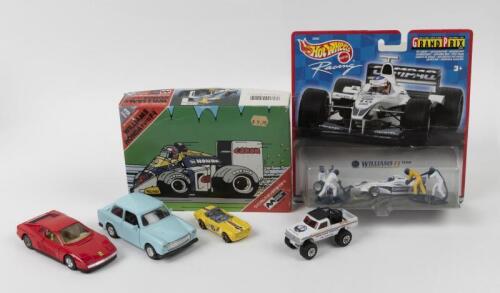 MODELS: An assortment of various model cars and toys. WILLIAMS HONDA FW-11 F1 kit by MISUWA MODEL (KIT No. 123 MR-500) & Hot Wheels Racing WILLIAMSF1 TEAM pit crew set (26680)