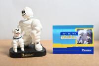 MICHELIN BOBBLEHEAD: An official Michelin bobblehead doll set featuring the Michelin Man and his dog. Circa 2004