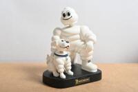 MICHELIN BOBBLEHEAD: An official Michelin bobblehead doll set featuring the Michelin Man and his dog. Circa 2004 - 2